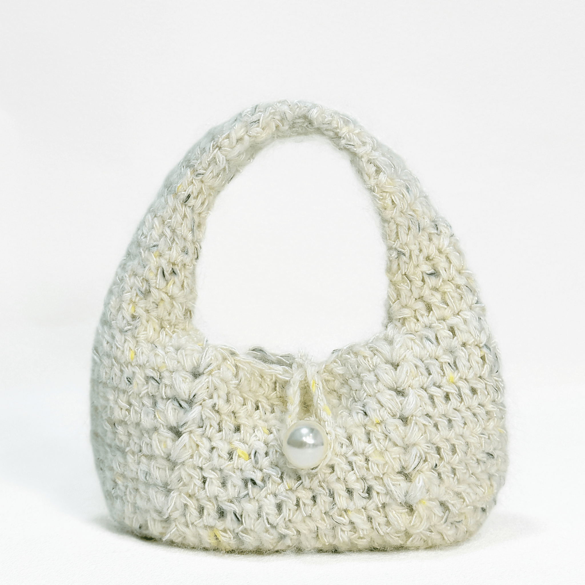 Chaine Trame - Textured Wool Wristlet Bag Crochet Kit in White ()